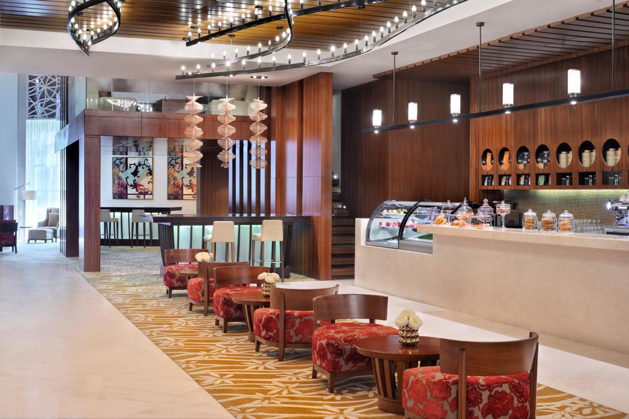 Marriott Executive Apartments Al Jaddaf, Dubai Exterior foto The Lounge at the airport