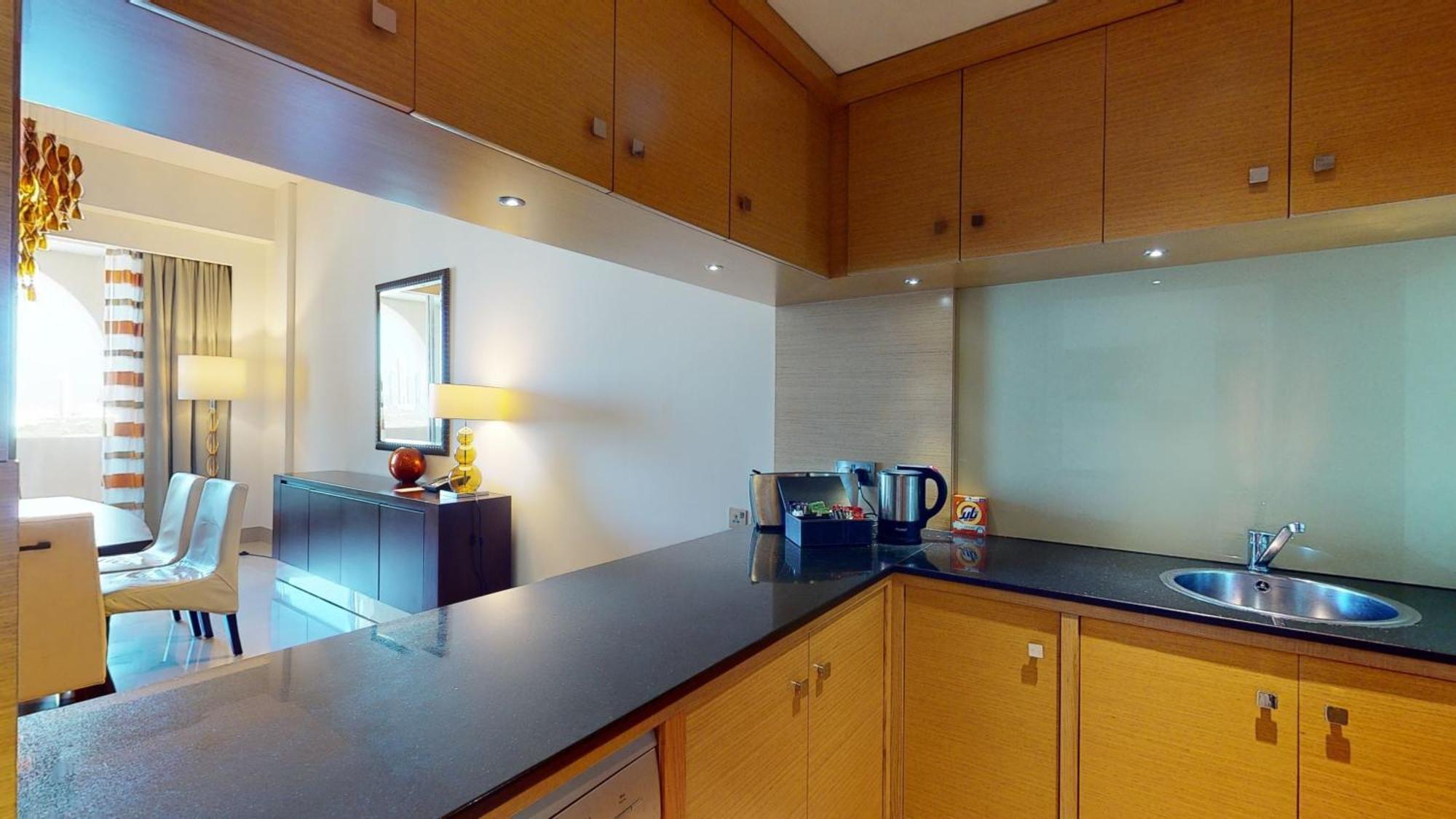 Marriott Executive Apartments Al Jaddaf, Dubai Quarto foto A typical kitchen in a serviced apartment